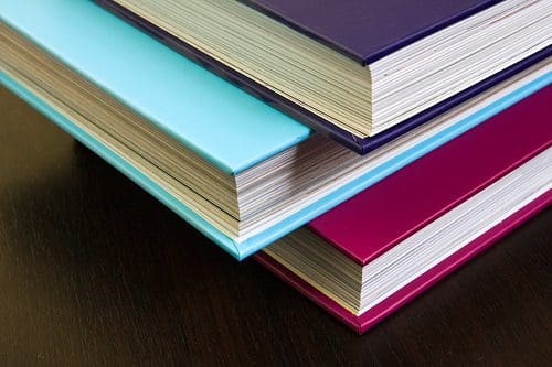 Thick encyclopedias with colorful hardcovers