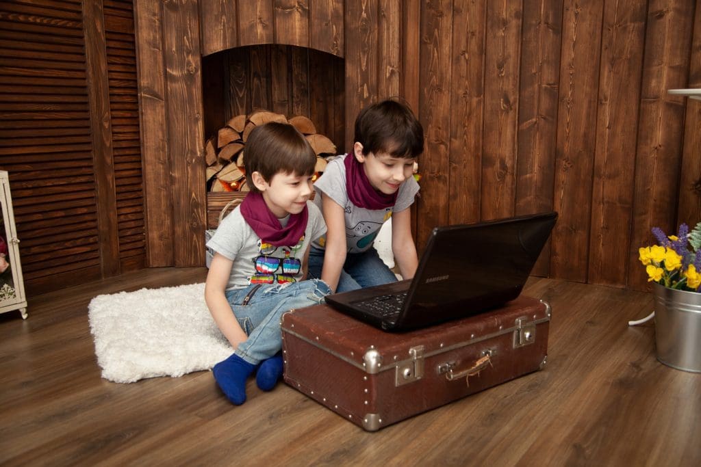 Boys looking at computer