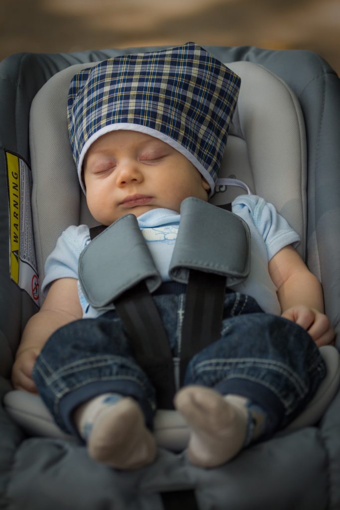 Baby sleeping in car seat