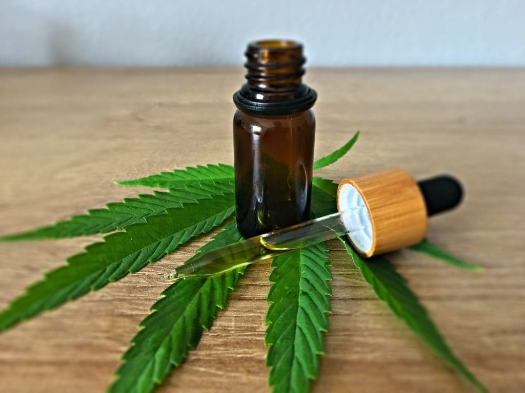 CBD oil and leaf