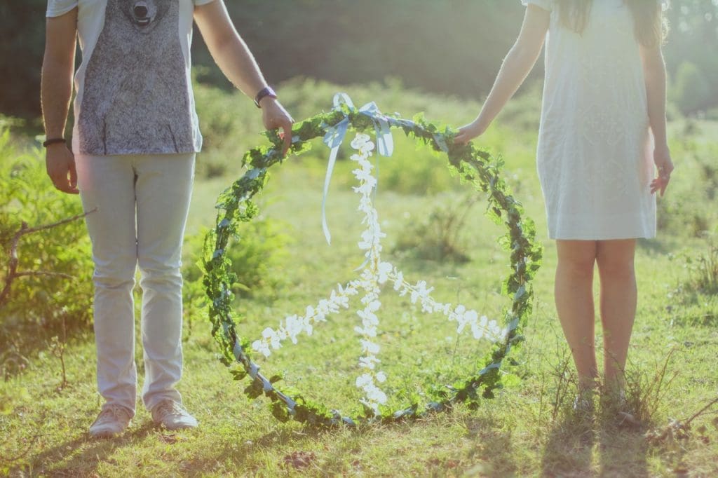 Holding a peace wreath