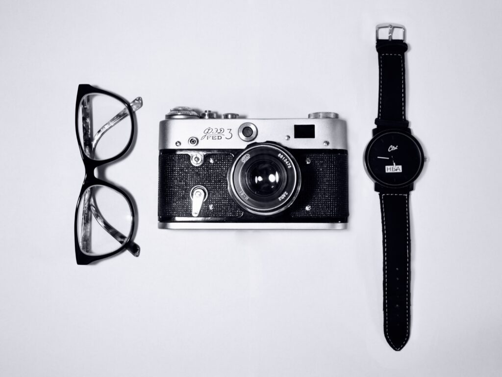 Eye glasses, camera, watch