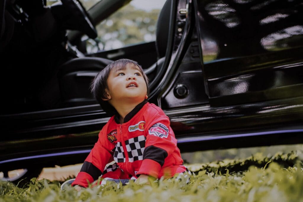 child sitting on the ground