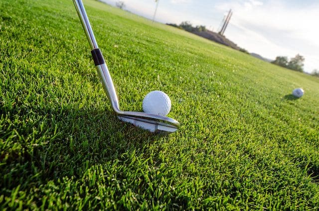 Golf ball and club