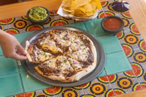 Read more about the article Exploring the Culinary Fusion of Tacos and Pizza