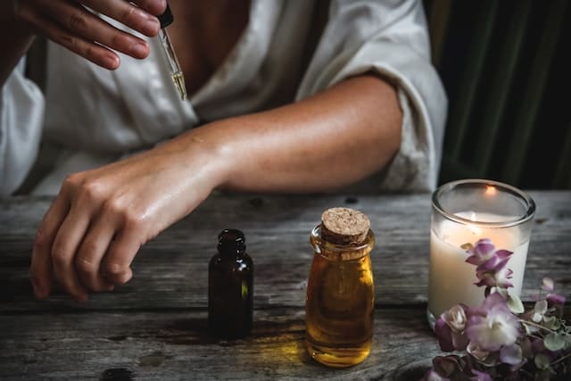 Placing oil on skin